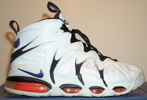 Nike Air CB-34 basketball sneaker, white with black and red-orange trim and purple SWOOSH