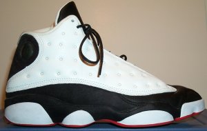 Air Jordan 13 basketball shoe in white, black, and red