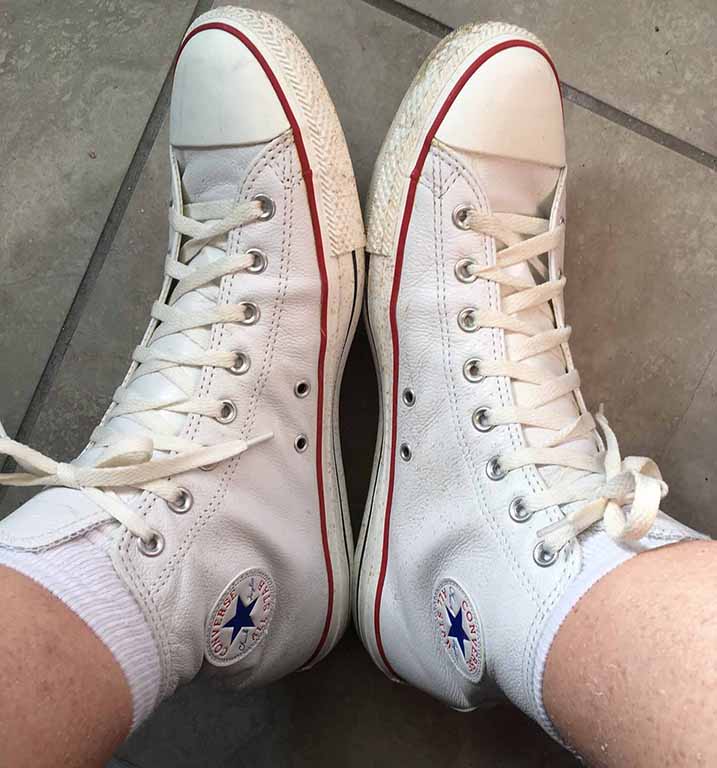 White leather Converse CTAS hightops