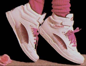 White and pink high-top LA Gear sneakers and pink scrunch socks