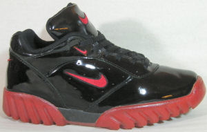 Nike Air Live Wire shoe in black with red SWOOSH and trim