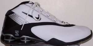 Nike Women's Shox Status basketball shoe: white with black SWOOSH, black and silver trim