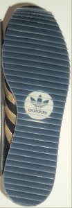 Sole of adidas Country Ripple shoe showing off adidas Trefoil logo