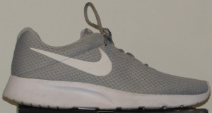 Gray Nike Tanjun sneakers with white SWOOSH