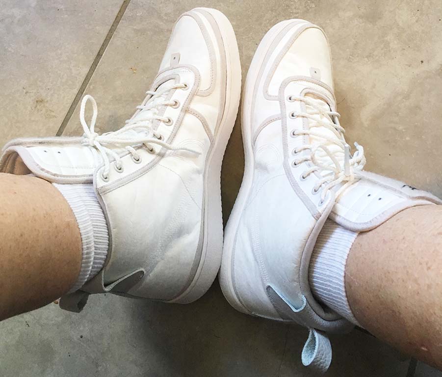 White Nike Vandal Supreme hightops with gray SWOOSH and trim