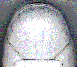 Closeup view of the adidas "Shell Toe" shoe toe