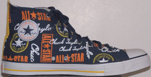 Converse "Chuck Taylor" All-Star high-tops in Navy with multicolored Chuck logo print