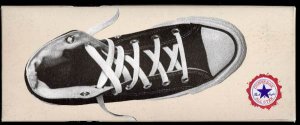 Converse "Chuck Taylor" All-Star shoebox lid with a top view of a pair of black high-top Chucks