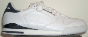 Reebok Phase I tennis sneaker: white with dark blue trim