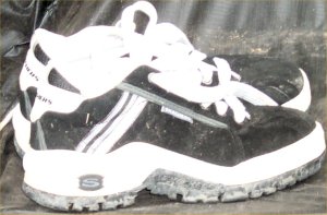 Black Skechers sneakers with white trim