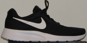 Nike Tanjun shoe in black with white SWOOSH