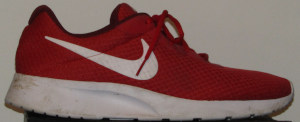 Red Nike Tanjun sneakers with white SWOOSH