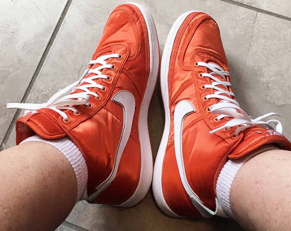 Orange Nike Vandal High Supreme sneakers