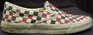 Example of Vans sneaker: black, red, and white checkerboard slip-on